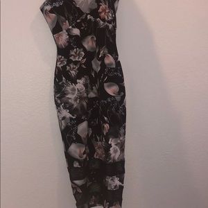 3/4 length dress with mesh sections at bottom